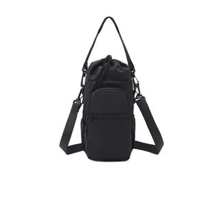 Detail view of the black multi-functional waterproof outdoor water bottle pouch and phone bag.