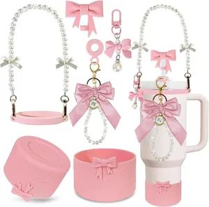 Ensemble d'accessoires de tasse en silicone rose avec sangle de perles et pendentif nœud.