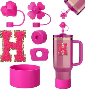 Pink Stanley cup accessories straw covers silicone boot letter patch set detail view
