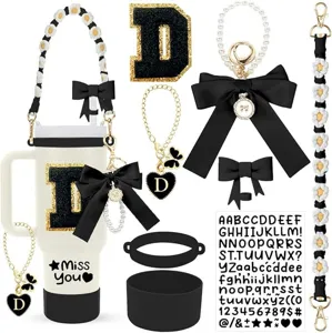 Stanley tumbler accessories set detail view showcasing cute bows and decorative straps.