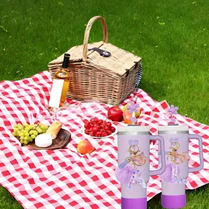 Stanley tumbler accessory set with purple insulated cup, glitter letter and cute charms.