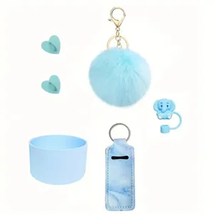 Detailed view of the blue water bottle accessory set with pompom keychain and silicone boot.