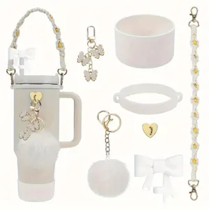 Stanley tumbler accessories set with braided flower strap, butterfly charms and plush pompom.