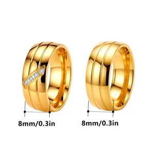 8mm wide stainless steel gold ring with double grooves and sparkling crystal stones detail.