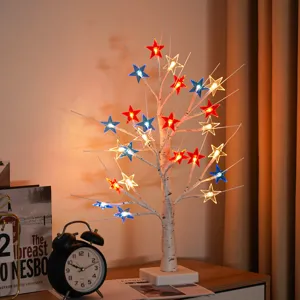 LED Birkenbaum Lampe mit rot weissen und blauen Sternen fuer Tisch Deko Party Innenbereich.