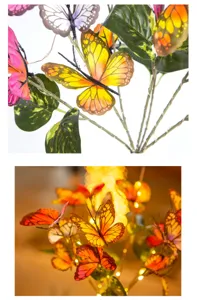 Nahaufnahme von Solar Schmetterling LED Gartenbeleuchtung, leuchtende Außendekoration.