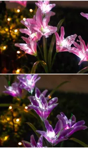 Gros plan montrant les pétales lumineux et les LED internes de la lampe solaire de jardin lys.