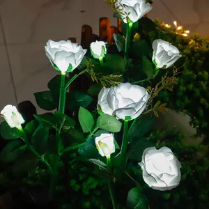 Outdoor solar rose flower lights, LED garden landscape stake lights for yard lawn decoration.
