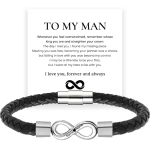 Men's braided leather bracelet with stainless steel magnetic clasp infinity charm detail view.