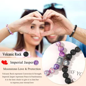Close-up detail of couple beaded bracelets featuring volcanic rock and imperial jasper beads.