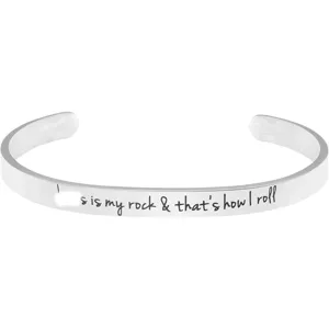 Stainless steel cuff bracelet detail showing engraved inspirational English text.