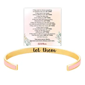 Gold stainless steel cuff bracelet detail shot, pink enamel inlay and inspirational message card.
