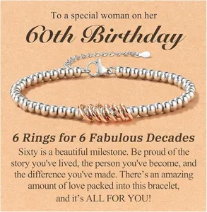 Silver bead bracelet with six rose gold rings for 60th birthday gift, adjustable jewelry.