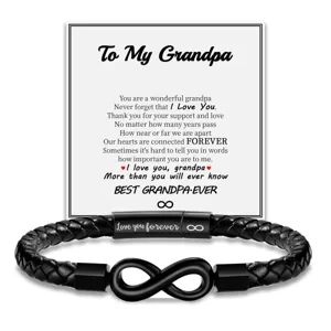 Detailed shot of men leather bracelet with infinity clasp and grandpa greeting message card.