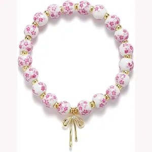 Blue and White Porcelain Ceramic Floral Bead Bracelet With Gold Bowknot Rhinestone Pendant Elastic Friendship Jewelry