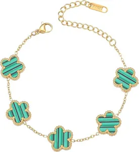 Gold titanium steel clover detail bracelet showcasing stylish green striped flower charms.