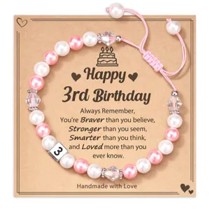 Handmade 3rd birthday pearl bracelet with pink beads, crystal accents and number 3 charm.