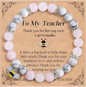 Teacher appreciation beaded bracelet with pink crystal, zebra stone beads and cute bee charm detail.