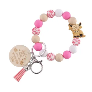 Porte-clés en perles de silicone avec pendentif vache écossaise et gland rose pour femme