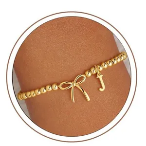 Minimalist Stainless Steel Bowknot Letter Charm Beaded Elastic Bracelet Gold Silver Tone Fashion Hand Jewelry Gift For Women