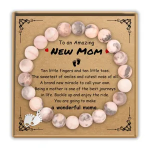 Pink zebra jasper beaded bracelet mother gift with footprint charm and sweet message card.