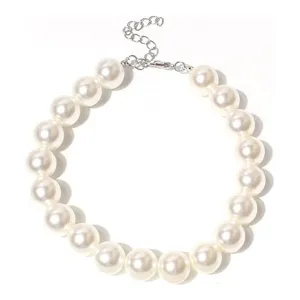 Chic white faux pearl pet necklace with silver chain extender, stylish collar for dogs and cats.