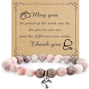 Nurse appreciation beaded bracelet with heart charm and inspirational card gift for women.