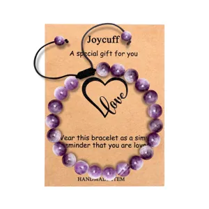 Natural amethyst beaded bracelet with adjustable black cord on gift card, ideal for women.