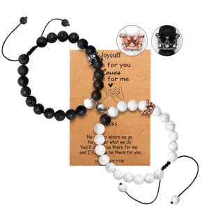 Couple lava stone and white howlite bead bracelets with crown charm and magnetic couple design
