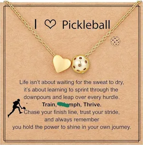 Gold pickleball necklace with heart pendant, sporty fashion jewelry gift for women.