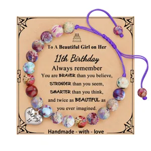 Handmade pink zebra jasper beaded bracelet with heart birthday card and adjustable cord.
