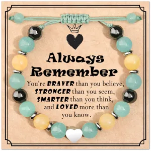 Handmade adjustable woven stone beaded bracelet with heart charm and inspirational quote card.