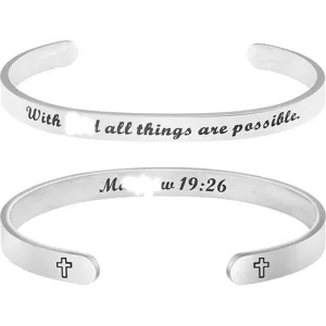 Stainless steel cuff bracelet close-up, inspirational scripture engraved detail.
