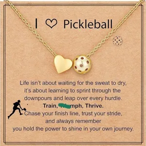 Gold-plated pickleball and heart pendant necklace with inspirational card main display