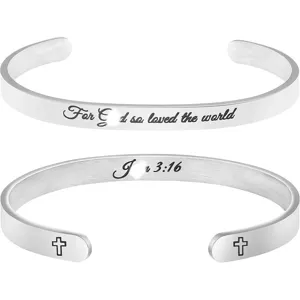 Stainless steel inspirational cuff bracelet with religious cross engraving detail.