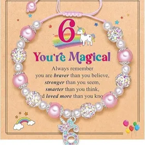 Kids pink pearl beaded bracelet with unicorn charm and cute inspirational card for girls.