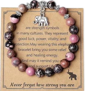 Natural stone pink zebra jasper elephant pendant beaded bracelet for women daily wear detail view.