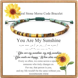 Detailed close-up shot of natural stone Morse code bracelet with sunflower card.