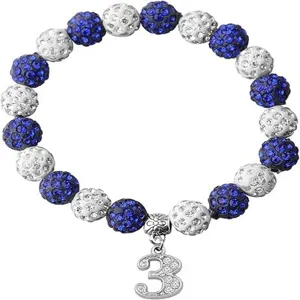 Close-up detail of the rhinestone clay beads and number pendant on the stylish bracelet.