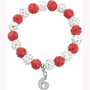 Red and white crystal clay rhinestone beaded bracelet with a number 6 pendant charm for sports.