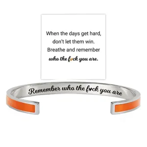 Stainless steel open cuff bracelet with orange enamel and inspirational engraved quote jewelry