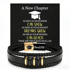 Detail view of men's braided leather bracelet with stainless steel clasp and graduation card design.