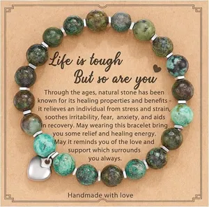 Natural stone beaded bracelet with heart pendant and inspirational message card for daily wear.