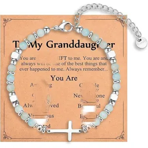 Stainless steel cross beaded bracelet detail showing natural stone beads and extension chain.