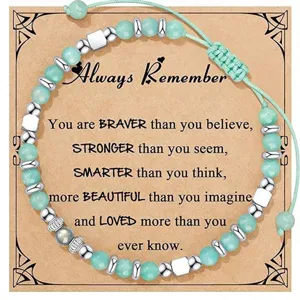 Exquisite beaded bracelet detail featuring natural stone beads and inspirational message card.