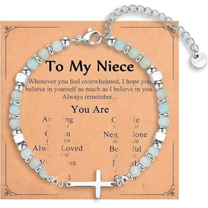 Detailed view of bohemian style natural stone beaded bracelet with stainless steel cross pendant.