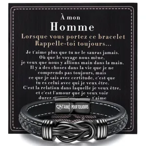 Detailed close-up of men's black leather magnetic bracelet with engraved French love message card.