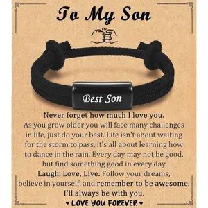 Adjustable black woven rope bracelet with engraved metal bar for son gift, stylish design.