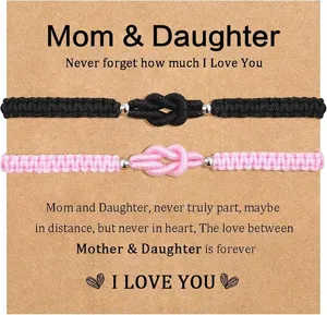 Mom and daughter braided bracelet set with knot design and kraft card packaging gift.