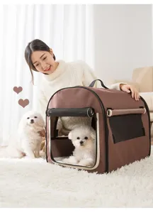 Portable brown pet carrier tent with mesh windows and soft interior for cats and dogs travel.